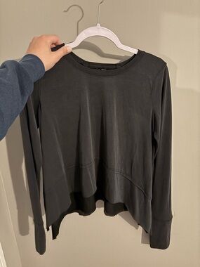 Women's Long-Sleeve Black Crewneck Top cropped asymmetrical hem
